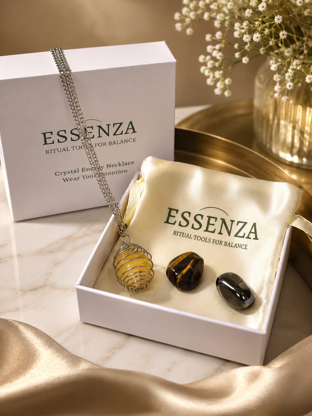Essenza crystal ritual bundle with citrine, tiger's eye and haematite in a gift box
